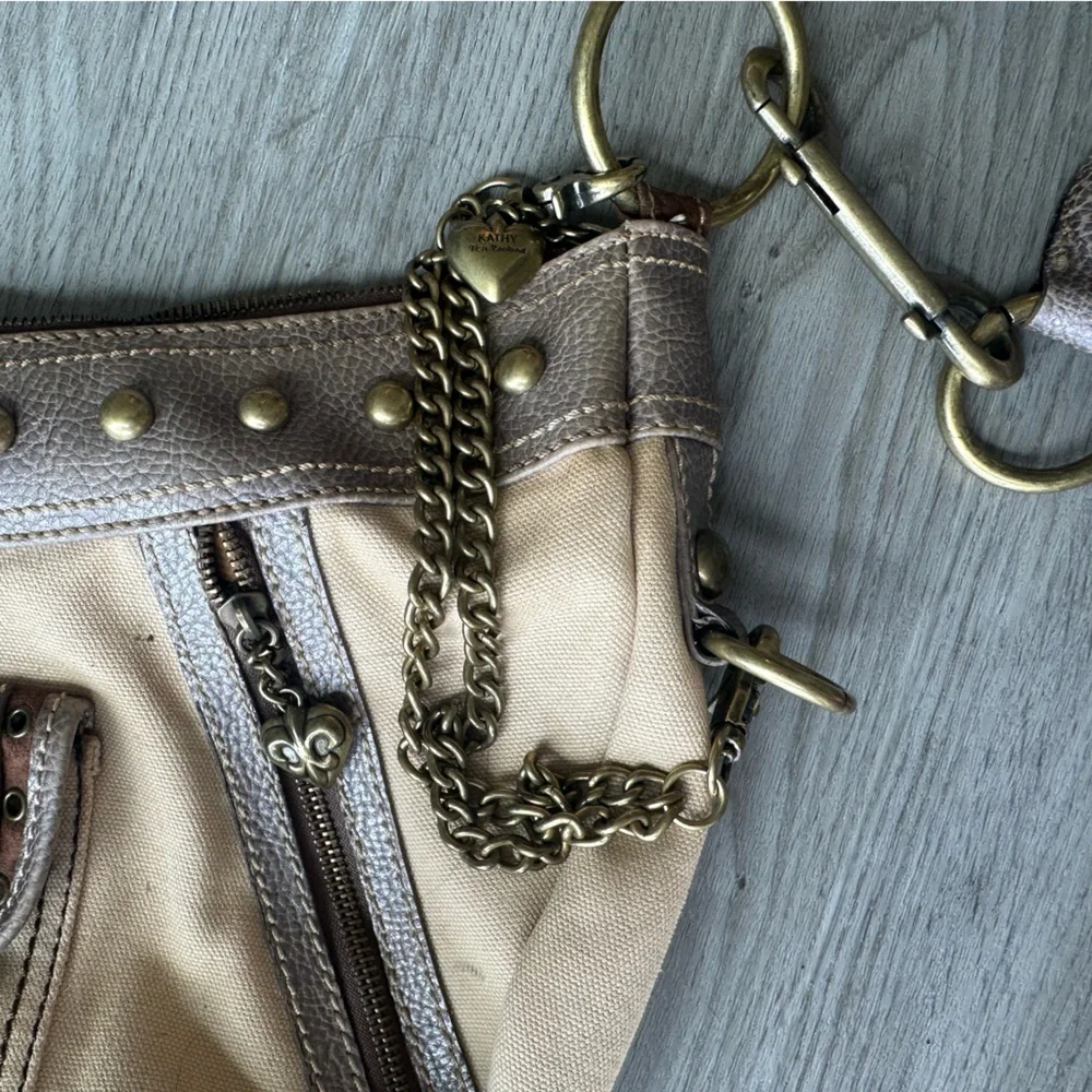 Kathy Van Zeeland brown and tan studded canvas + leather shoulder bag